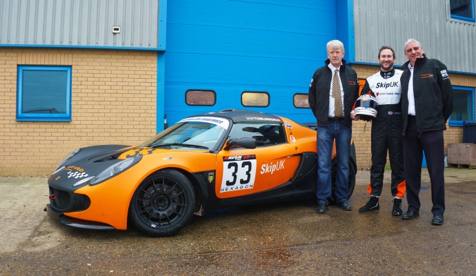 Sam Tomlinson (centre) with Skip UK directors Trevor Tinker (left) and Barry Dean, and the Lotus Elise he will be driving in 2017.